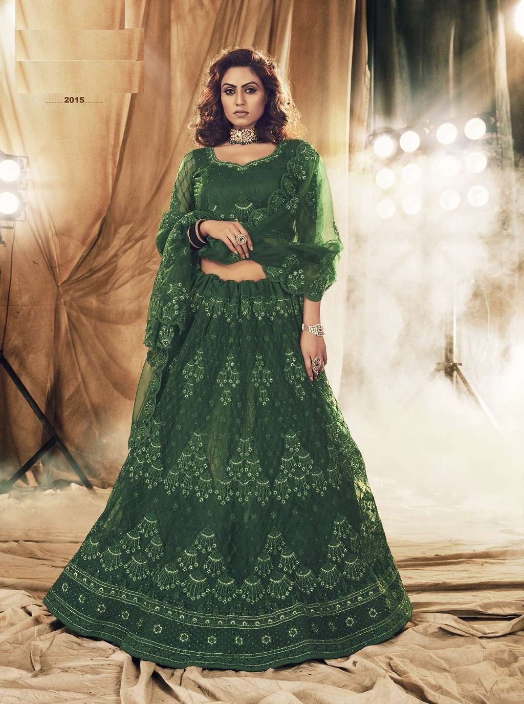 PREMIUM DESIGNER WEDDING GREEN LEHENGA CHOLI IN NET FABRIC COLLECTION 2015