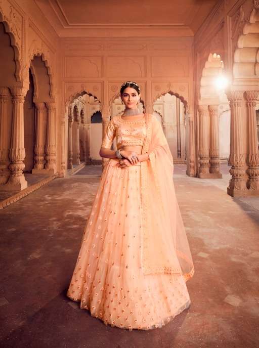 BEST QUALITY DESIGNER WEDDING PARTY WEAR ORANGE LEHENGA IN NET FABRIC AT WHOLESALE RATE SM AAHVAN 1101