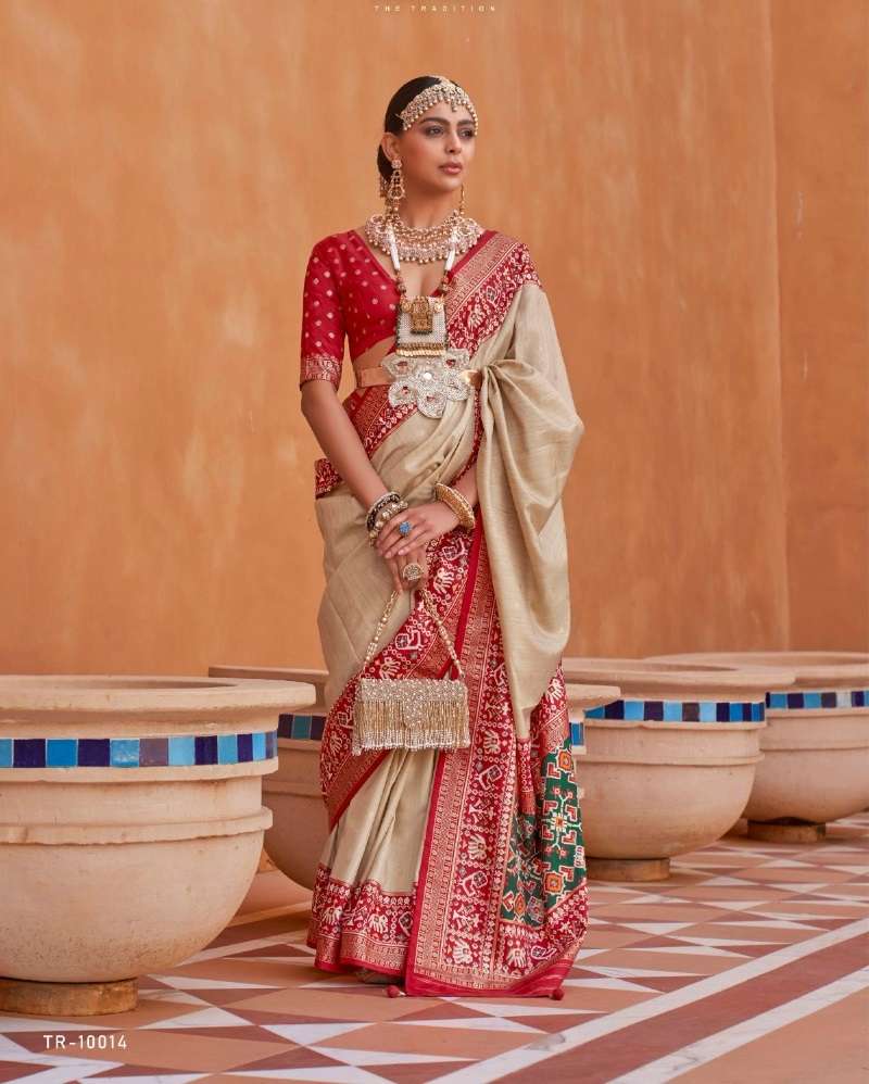 LATEST DESIGNER FANCY WEDDING PARTY WEAR HEAVY CHIKU BANARASI SILK FABRIC SAREE SM TRIRATH 10014