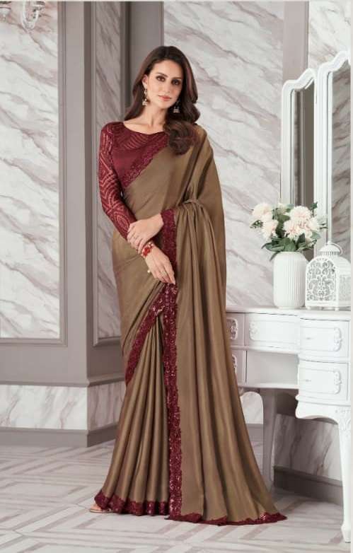 DESIGNER FANCY FABRIC NEW STYLISH CHIKU BOLLYWOOD SAREE IN IMPORTED FANCY FABRIC SM ANMOL EXOTIQUE 9008