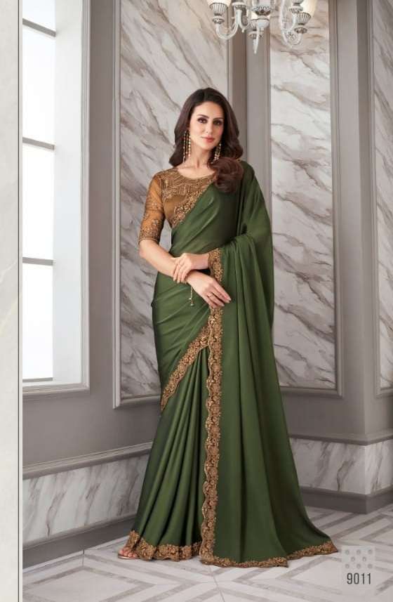 DESIGNER FANCY FABRIC NEW STYLISH GREEN BOLLYWOOD SAREE IN IMPORTED FANCY FABRIC SM ANMOL EXOTIQUE 9011