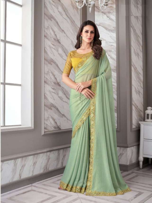 DESIGNER FANCY FABRIC NEW STYLISH PISTA BOLLYWOOD SAREE IN IMPORTED FANCY FABRIC SM ANMOL EXOTIQUE 9009