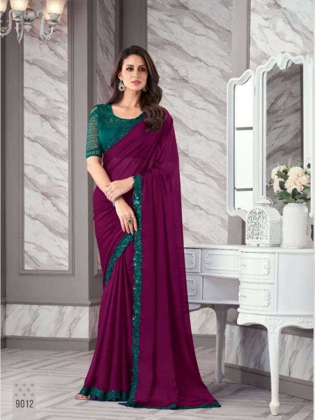 DESIGNER FANCY FABRIC NEW STYLISH WINE BOLLYWOOD SAREE IN IMPORTED FANCY FABRIC SM ANMOL EXOTIQUE 9012