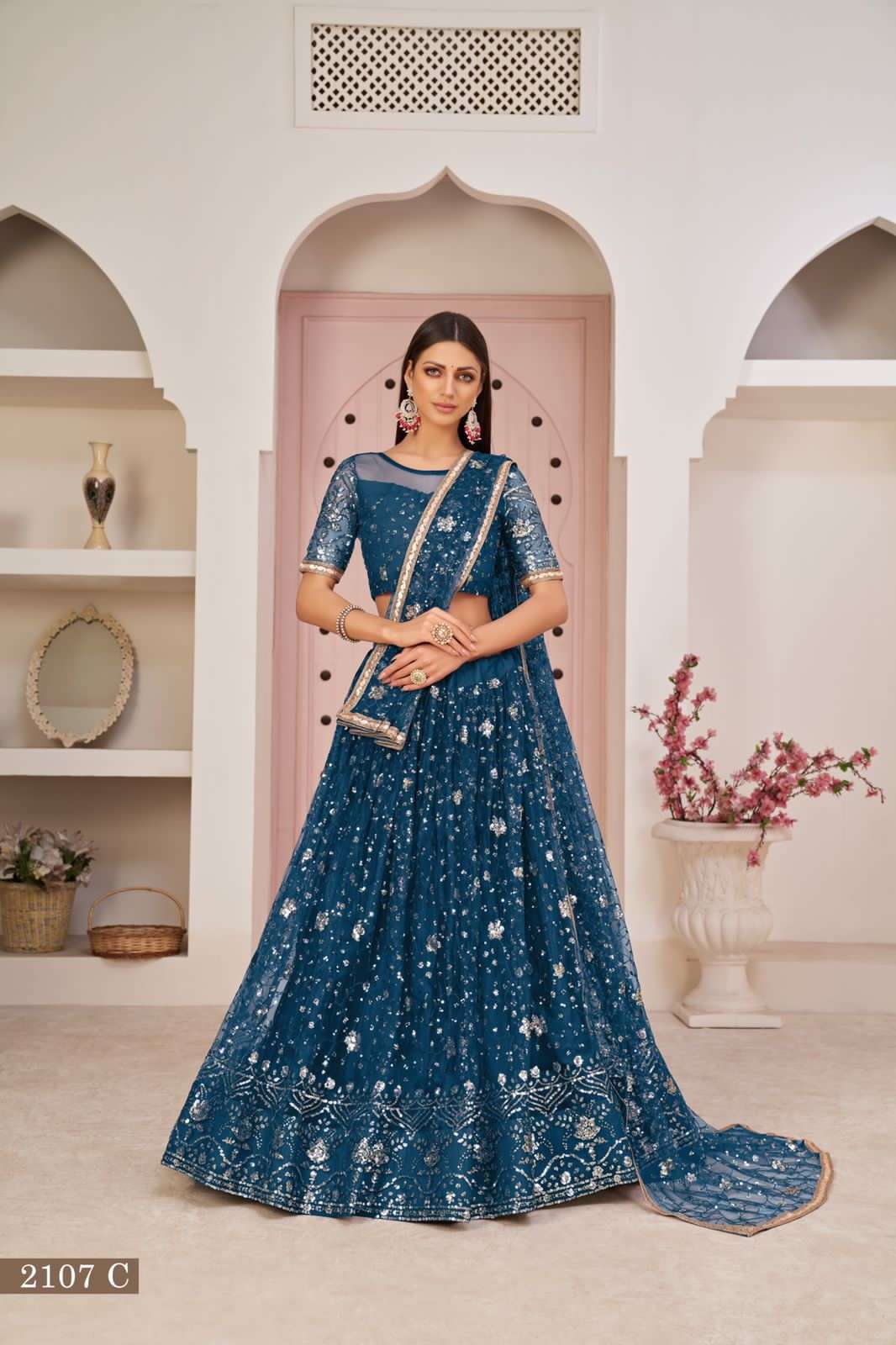 INDIAN BOLLYWOOD DESIGNER FANCY WEDDING PARTY WEAR MOR PICH NET FABRIC LEHENGA WITH THREAD SEQUENCE DST NARAYANI 2107C