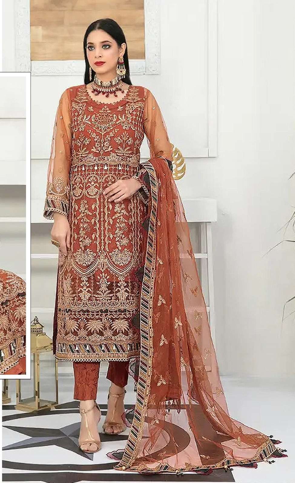 DESIGNER FANCY WEDDING PARTY WEAR ORANGE PAKISTANI SALWAR SUIT IN NET FABRIC JG 5107A