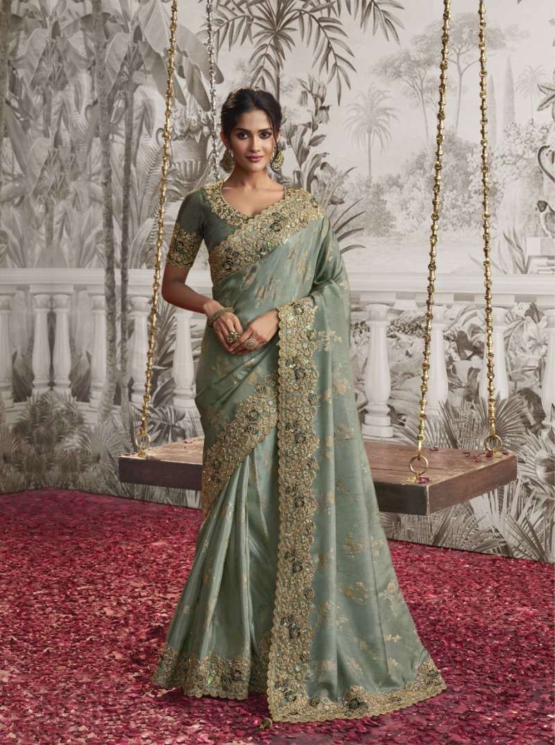 LATEST DESIGNER FANCY WEDDING PARTY WEAR HEAVY HEAVY GREEN SILK SAREE SM SULAKSHMI NOOR 8205