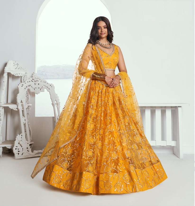 PREMIUM DESIGNER PARTY WEAR HEAVY NET YELLOW LEHENGA NEW DESIGN DST NARAYN CHANDRAKALA 7004