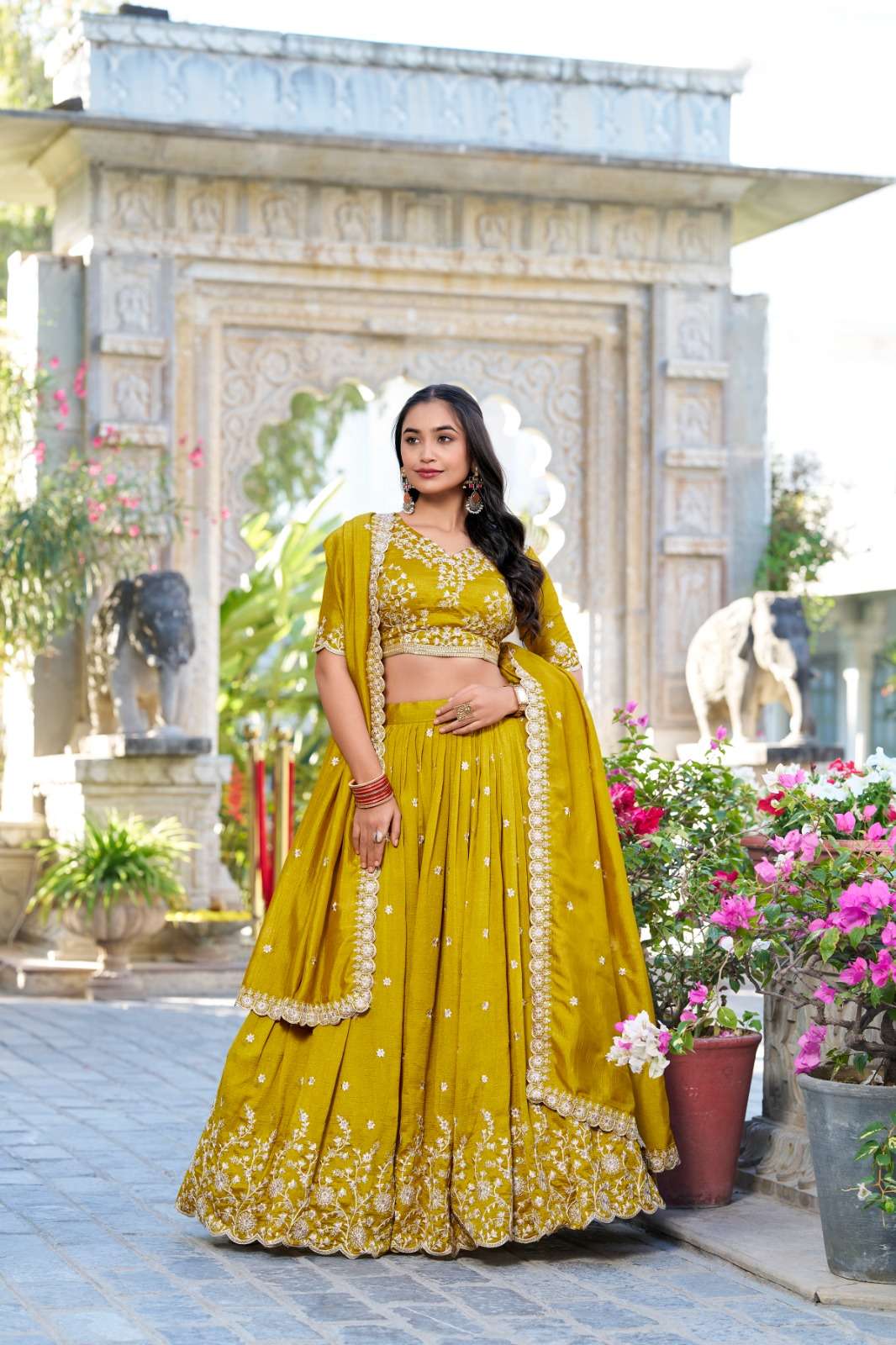 DESIGNER YELLOW SILK FABRIC PARTY WEDDING HALDI FUNCTION WEAR LEHENGAS PC 1415