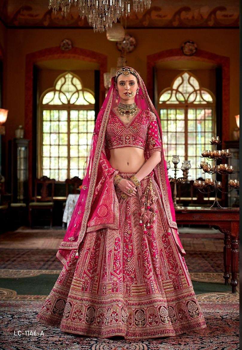 DESIGNER WEDDING BRIDAL WEAR INDIAN HEAVY RANI PINK SILK LEHENGA CHOLI WITH NET DUPATTA MANJULLA 1146 A