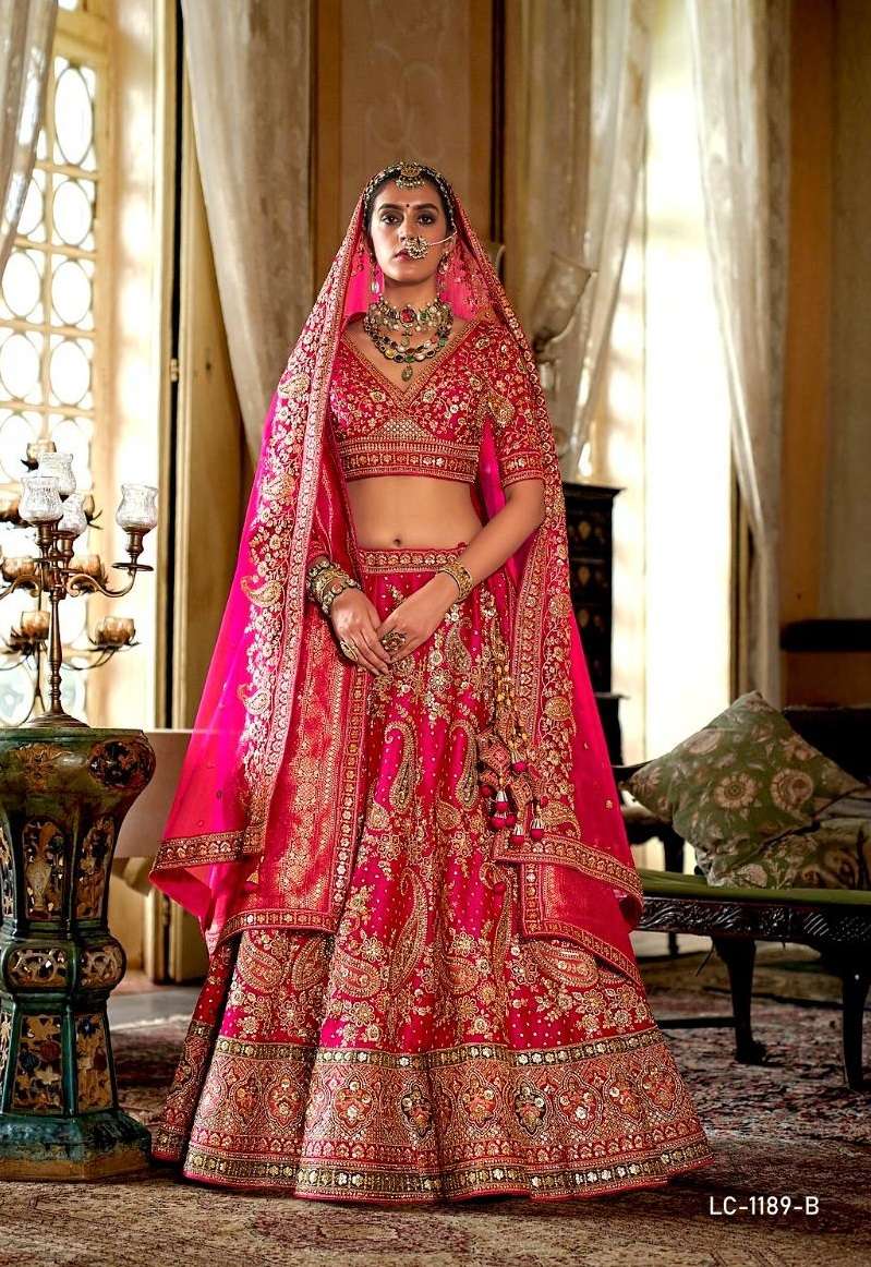 DESIGNER WEDDING BRIDAL WEAR INDIAN HEAVY RANI PINK SILK LEHENGA CHOLI WITH NET DUPATTA MANJULLA 1189 B