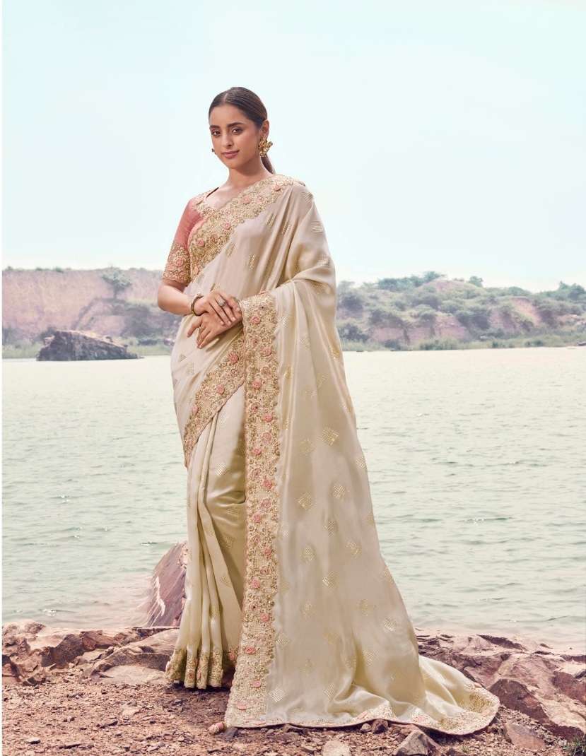 DESIGNER PARTY WEAR HEAVY SILK CREAM SAREE WITH SEQUENCE BEAD WORK COLLECTION SM SULAKSHMI 8607