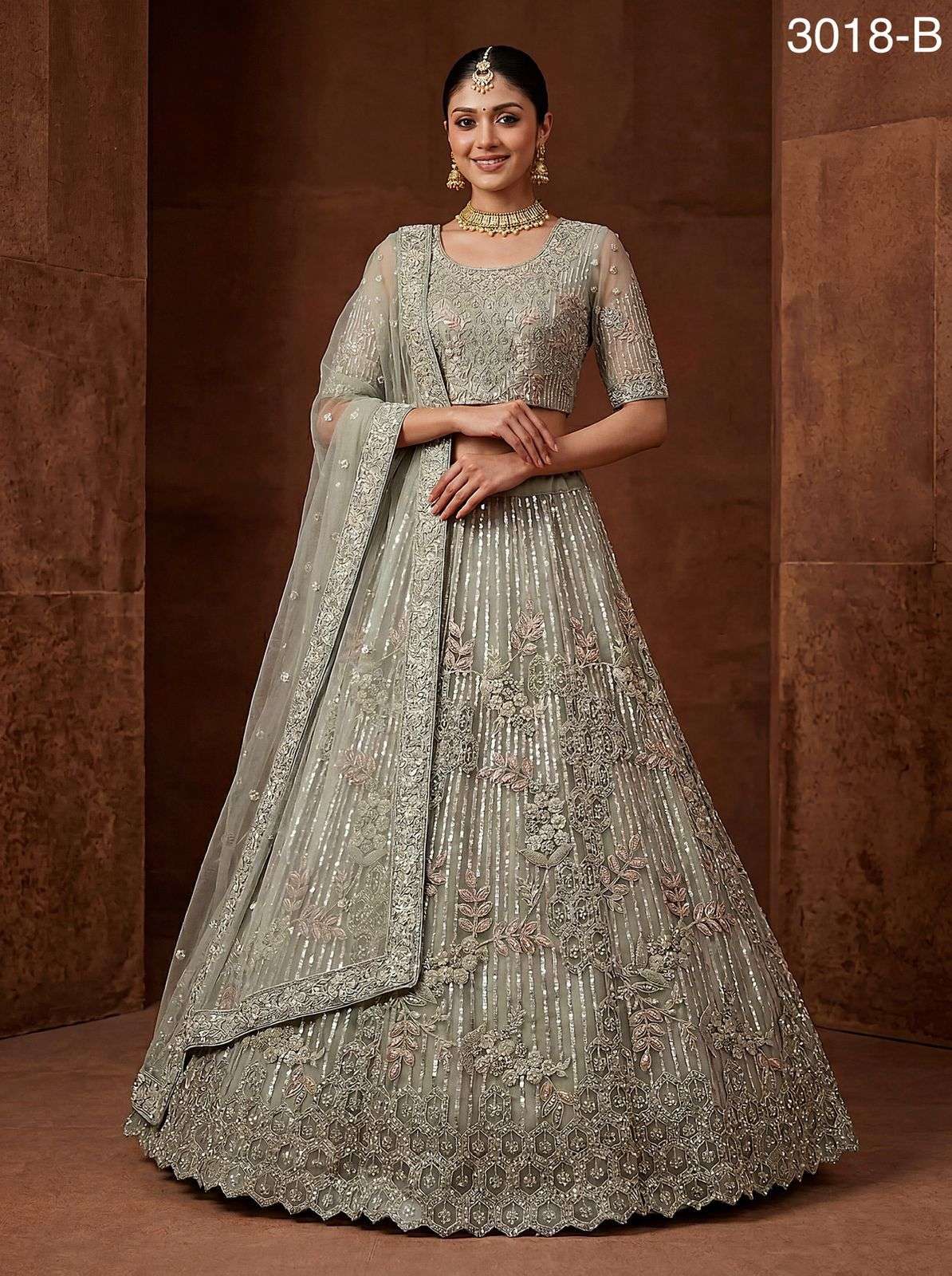 PREMIUM BRIDAL DESIGNER HEAVY GREEN NET LEHENGA WITH ZARKAN AND SQUENCE WORK DESIGN SM 3018 B